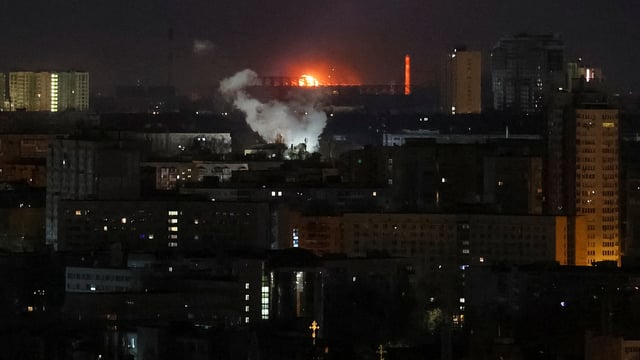A drone explodes in the sky over the city during a Russian drone strike, amid Russia's attack on Ukraine, in Kyiv, Ukraine April 12, 2025. 