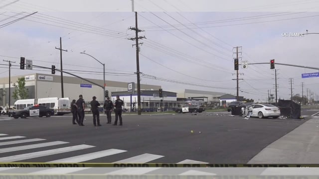 The driver and passenger of a Tesla were killed after the car ran a red light and struck a pickup and Orange County Transit Authority bus in Fullerton Saturday morning, April 12. (Photo by OC Hawk)