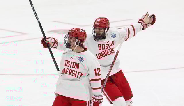 Jack Harvey #12 of the Boston University Terriers celebrates his empty net goal in the final seconds against the Penn State Nittany Lions with his teammate Jack Hughes in the third period during the NCAA Men&#39;s Hockey Frozen Four semifinal at the Enterprise Center on April 10, 2025 in St. Louis, Missouri.