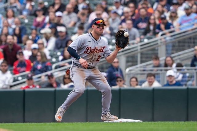 Apr 12, 2025; Minneapolis, Minnesota, USA; Detroit Tigers first baseman Spencer Torkelson (20) fields the ball for the out during the sixth inning against the Minnesota Twins at Target Field. Mandatory Credit: Jordan Johnson-Imagn Images