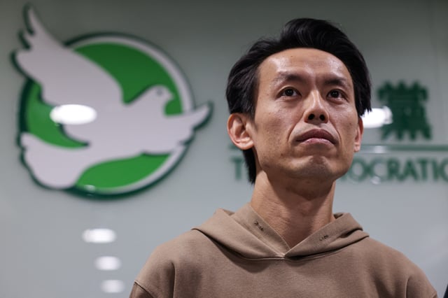 Lo Kin-hei, Chairman of the Democratic Party, attends at a news conference after an extraordinary general meeting to seek members' views on the potential dissolution of the party in Hong Kong, China, April 13, 2025. REUTERS/Tyrone Siu