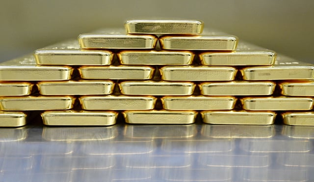 FILE PHOTO: Gold bars are stacked in the safe deposit boxes room of the Pro Aurum gold house in Munich, Germany, January 10, 2025. REUTERS/Angelika Warmuth/File Photo/File Photo