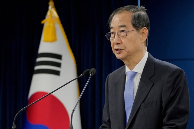 South Korean acting President Han Duck-soo speaks during a briefing at the Government Complex in Seoul, South Korea, Monday, March 24, 2025. Ahn Young-joon/Pool via REUTERS/File Photo