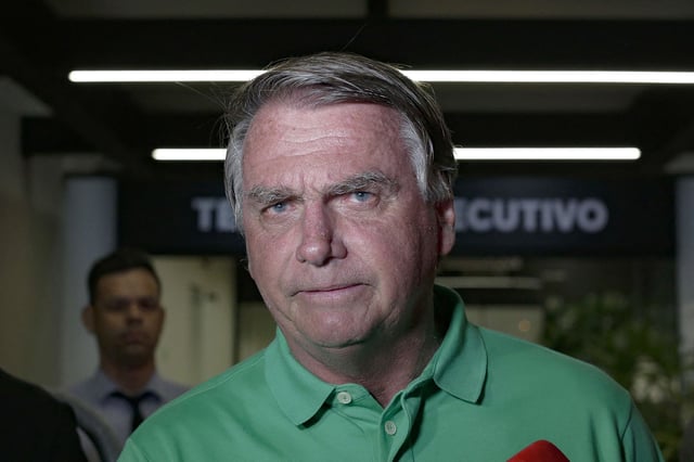 Former Brazilian President (2019-2022) Jair Bolsonaro on arrival at Brasilia airport on March 6, 2025.  (Photo by Sergio Lima / AFP)