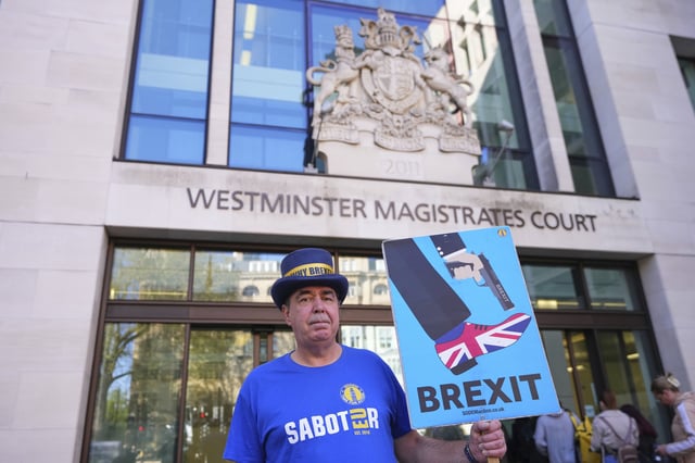 Anti-Brexit campaigner Steve Bray poses as he arrives at Westminster Magistrates Court in London, Monday, April 14, 2025. (AP Photo/Kirsty Wigglesworth)