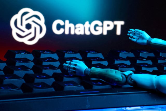 The ChatGPT logo, a keyboard, and robot hands are seen in this illustration taken January 27, 2025. REUTERS/Dado Ruvic/Illustration/File Photo