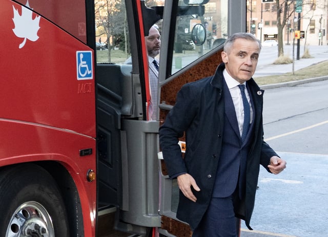 Liberal Leader Mark Carney arrives for a television interview at Maison de Radio Canada during a campaign stop in Montreal on April 13, 2025. Carney and Conservative Leader Pierre Poilievre are both campaigning in Montreal days before the federal leaders take part in debates.