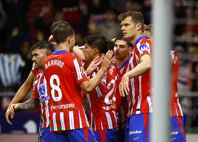 Soccer Football - LaLiga - Atletico Madrid v Real Valladolid - Metropolitano, Madrid, Spain - April 14, 2025 Atletico Madrid's Julian Alvarez celebrates scoring their third goal with teammates REUTERS/Susana Vera