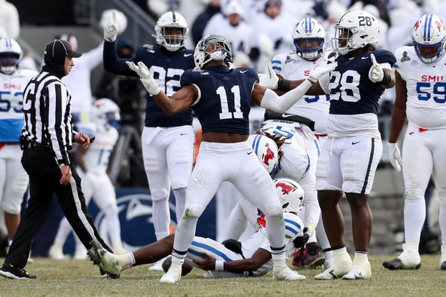 Penn State Nittany Lions defensive end Abdul Carter (11) reacts after sacking Southern Methodist Mustangs quarterback Kevin Jennings (7) during the third quarter in the first round of the College Football Playoff at Beaver Stadium
