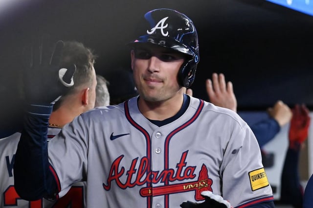 Atlanta Braves third baseman Austin Riley (27) celebrates his three-run home run against the Blue Jays in the fifth inning of the interleague game in Toronto on Monday, April 14, 2025. THE CANADIAN PRESS/Jon Blacker