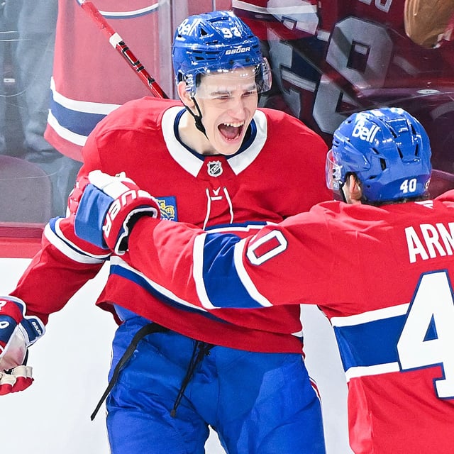 Montreal Canadiens' Ivan Demidov (93) celebrates with teammate Joel Armia (40) after scoring against the Chicago Blackhawks during first period NHL hockey action in Montreal, Monday, April 14, 2025. THE CANADIAN PRESS/Graham Hughes
