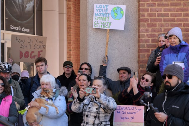 Hundreds of demonstrators gather to protest against Department of Government Efficiency (DOGE) cuts outside the headquarters of the National Oceanic and Atmospheric Administration on March 03, 2025 in Silver Spring, Maryland.