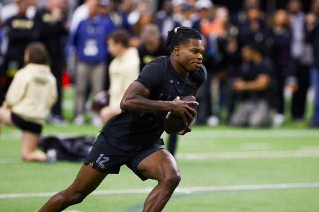 Apr 4, 2025; Boulder, CO, USA; Colorado Buffaloes wide receiver Travis Hunter (12) runs drills at the University of Colorado NFL Showcase at the CU Indoor Practice Facility. Mandatory Credit: Michael Ciaglo-Imagn Images/ File Photo
