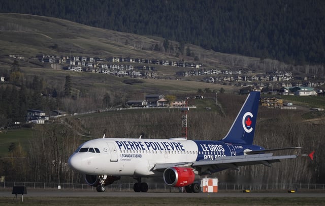 Conservative Leader Pierre Poilievre&#39;s chartered Air Canada plane arrives at Kelowna International Airport, in Kelowna, B.C., on Friday, April 4, 2025.