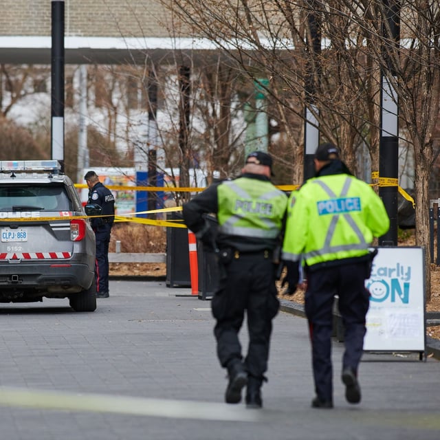 Police survey the scene at Toronto Metropolitan University after a vehicle drove through the pedestrian walkway on Nelson Mandela Walk, hitting four people on April 15, 2025.
April 15, 2025.
(Sammy Kogan/The Globe and Mail)