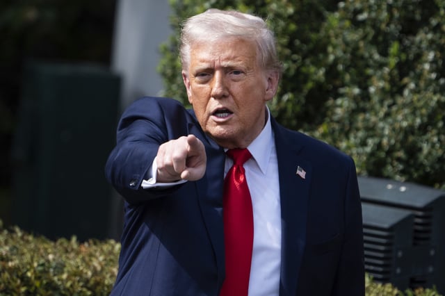 President Donald Trump attends a ceremony with the Ohio State Buckeyes at the White House on April 14, 2025. Trump is expected to sign a memorandum on April 15, aimed at stopping ineligible people from claiming Social Security benefits.