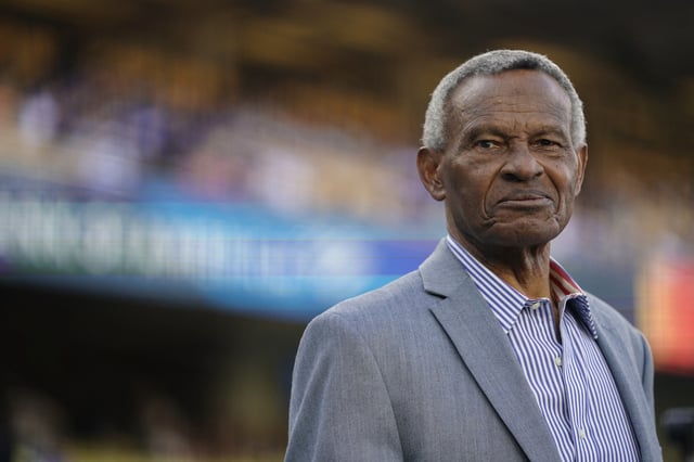 Apr 29, 2023; Los Angeles, California, USA; Los Angeles Dodgers broadcaster and former player Manny Mota prior to being inducted into the ÔLegends of Dodger BaseballÕ pregame ceremony before a game against the St. Louis Cardinals at Dodger Stadium. Mandatory Credit: Lucas Peltier-USA TODAY Sports/File photo