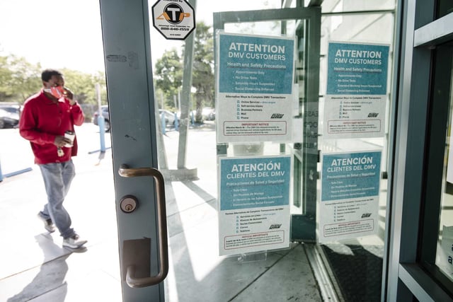 A patron visits a Department of Motor Vehicles office in Oakland. A water leak in the ceiling of the Oakland Coliseum DMV field office led staff to uncover extensive vandalism and theft, prompting a months-long closure of the facility, officials announced Tuesday.
