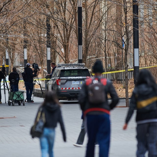 Police survey the scene at Toronto Metropolitan University after a vehicle drove through the pedestrian walkway on Nelson Mandela Walk, hitting four people on April 15, 2025.
April 15, 2025.
(Sammy Kogan/The Globe and Mail)