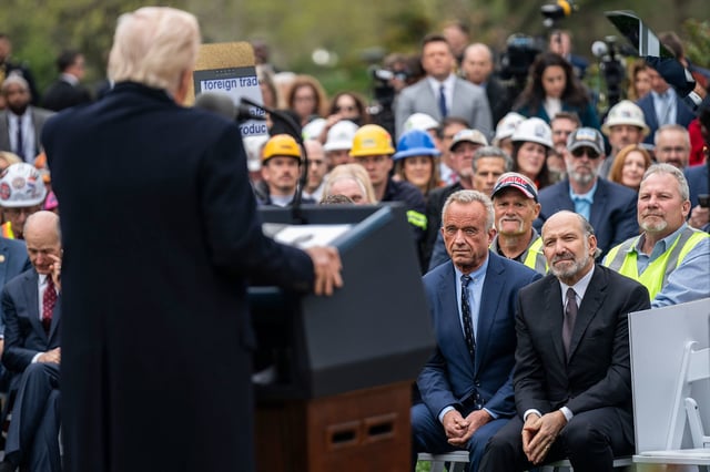 Washington, DC - April 02 : Health and Human Services Secretary Robert F. Kennedy Jr., and Commerce Secretary Howard Lutnick listen as President Donald J Trump speaks before signing an executive orders on tariffs during a Make America Wealthy Again event in the Rose Garden at the White House on Wednesday, April 02, 2025 in Washington, DC. (Photo by Jabin Botsford/The Washington Post via Getty Images)