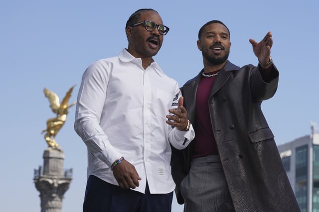 Filmmaker Ryan Coogler, left, and actor Michael B. Jordan, pose for a photo during a photocall promoting the supernatural horror film "Sinners" in Mexico City, Sunday, March 30, 2025. (AP Photo/Fernando Llano)