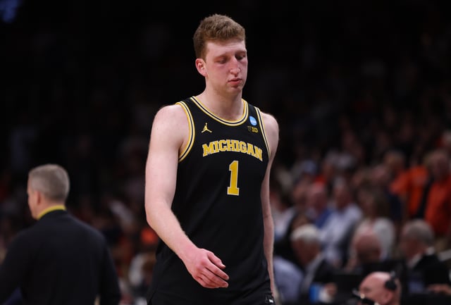 Mar 28, 2025; Atlanta, GA, USA; Michigan Wolverines center Danny Wolf (1) reacts after losing to the Auburn Tigers in a South Regional semifinal of the 2025 NCAA tournament at State Farm Arena. Mandatory Credit: Brett Davis-Imagn Images/ File Photo