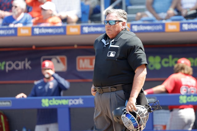 Mar 13, 2025; Port St. Lucie, Florida, USA; Umpire Hunter Wendelstedt (21) works home plate during fifth inning between the New York Mets and the Boston Red Sox at Clover Park. Mandatory Credit: Reinhold Matay-Imagn Images/File photo