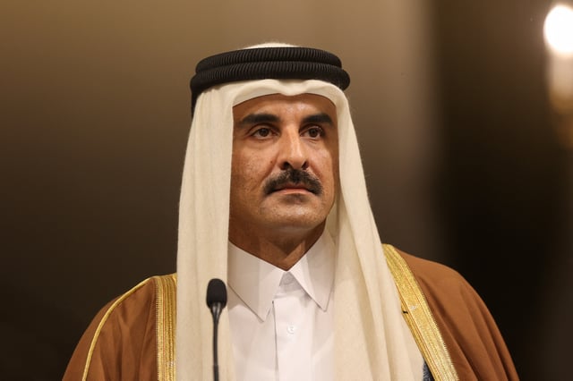 Emir of Qatar Sheikh Tamim bin Hamad Al Thani looks on as he attends a press conference with Iranian President Masoud Pezeshkian (not pictured), in Tehran, Iran. February 19, 2025. Majid Asgaripour/WANA (West Asia News Agency) via REUTERS/File Photo