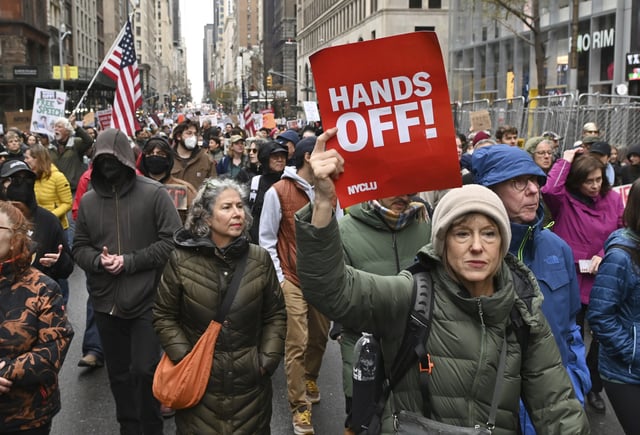 Protesters march down Fifth Avenue between 42nd Street and 23rd Street to speak out against President Trump and Elon Musk&#39;s agendas regarding health care, social security and other policies.