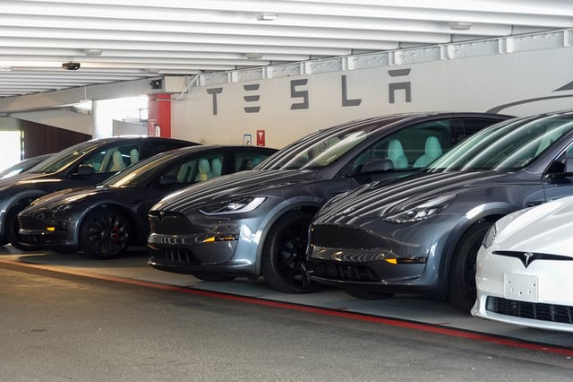 Tesla vehicles are shown near one of the company’s retail stores in San Diego, California, U.S.,October 20, 2023.     REUTERS/Mike Blake/File Photo