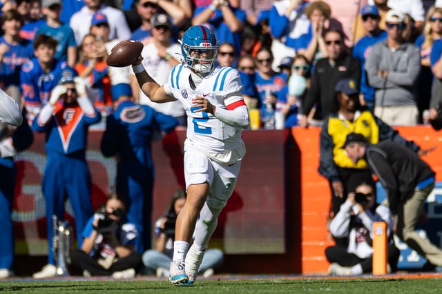 Mississippi Rebels quarterback Jaxson Dart (2) throws the ball against the Florida Gators during the first half at Ben Hill Griffin Stadium.