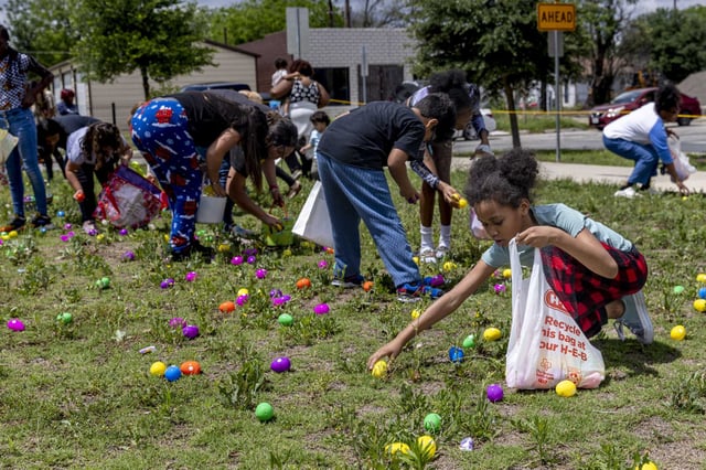 Children excitedly collect Easter eggs at Phillis Wheatley Park in San Antonio on April 8, 2023. This year, San Antonio has a chance of storms overnight Saturday into early Easter Sunday.