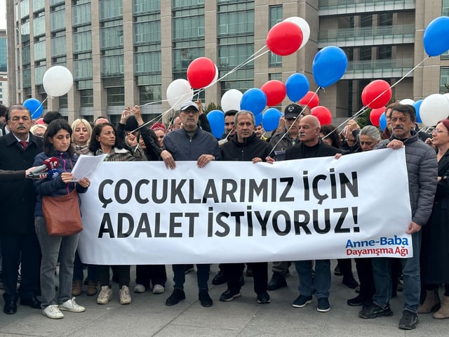 Turkish citizens protest outside the Istanbul court on Friday, holding a sign reading, "We want justice for our children."