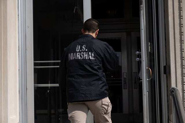 U.S. Marshals enter a U.S. District Courthouse in New Jersey.