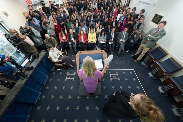 White House press secretary Karoline Leavitt speaks with reporters in the James Brady Press Briefing Room at the White House, Wednesday, April 16, 2025, in Washington, as Patty Morin, mother of Rachel Morin listens. (AP Photo/Alex Brandon)