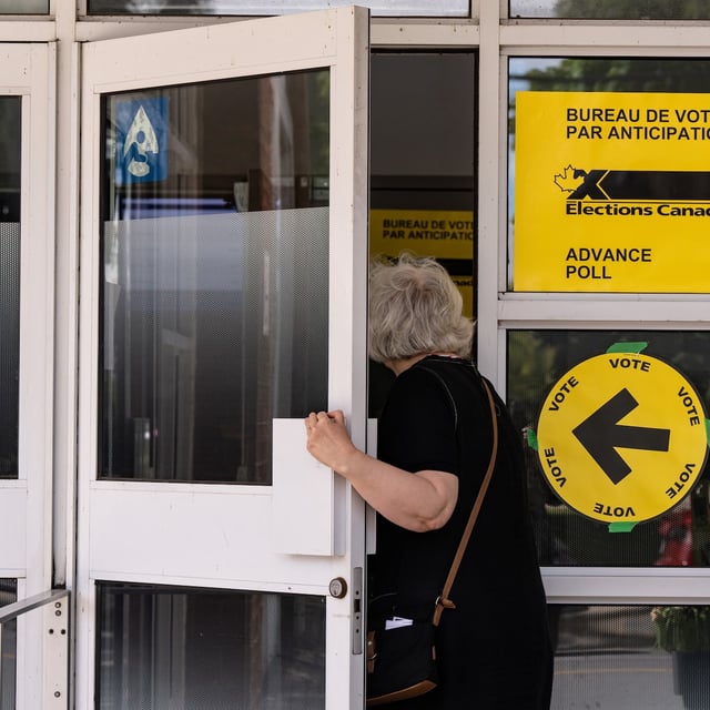 Voters head to the advance polls in Verdun, Que., Monday, Sept. 9, 2024. THE CANADIAN PRESS/Christinne Muschi