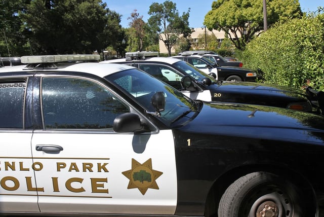Menlo police cars parked at the station. Michelle Le/The Almanac