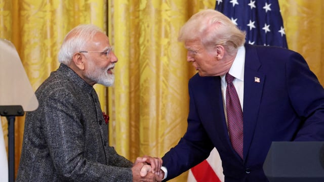 US President Donald Trump and Indian Prime Minister Narendra Modi shake hands as they attend a joint press conference at the White House in Washington, D.C., U.S., February 13, 2025. 