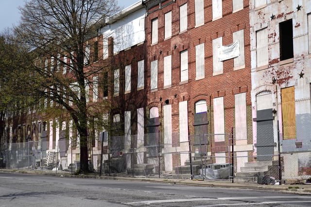 Abandoned row homes are seen in the Sandtown-Winchester neighborhood in Baltimore, Monday, April 14, 2025. (AP Photo/Stephanie Scarbrough)