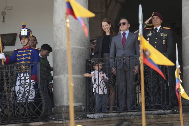 Ecuador's President Daniel Noboa, his wife Lavinia Valbonesi and their son Alvaro attend the changing of the presidential guard ceremony at Carondelet Palace in Quito, Ecuador, Tuesday, April 15, 2025. (AP Photo/Dolores Ochoa)