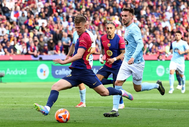 Soccer Football - LaLiga - FC Barcelona v Celta Vigo - Estadi Olimpic Lluis Companys, Barcelona, Spain - April 19, 2025 FC Barcelona's Dani Olmo scores their second goal REUTERS/Albert Gea