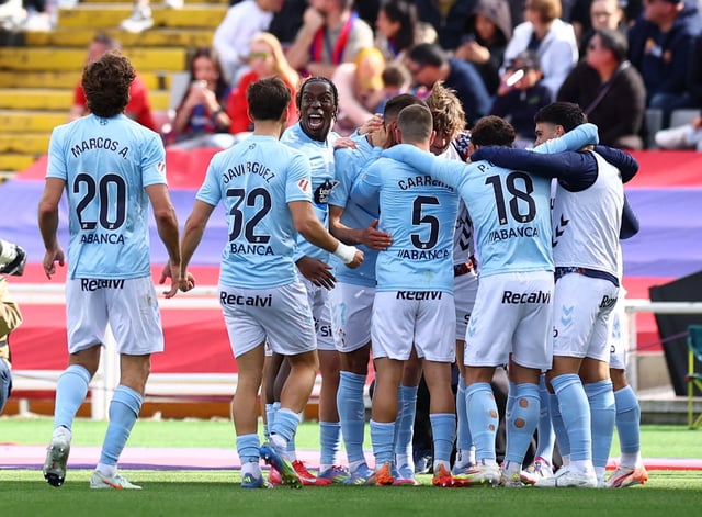 Soccer Football - LaLiga - FC Barcelona v Celta Vigo - Estadi Olimpic Lluis Companys, Barcelona, Spain - April 19, 2025 Celta Vigo's Borja Iglesias celebrates scoring their second goal with teammates REUTERS/Albert Gea