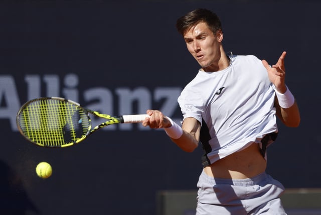 Tennis - ATP 500 - Munich Open - MTTC Iphitos, Munich, Germany - April 19, 2025 Hungary's Fabian Marozsan in action during his semi final match against Germany's Alexander Zverev REUTERS/Michaela Stache