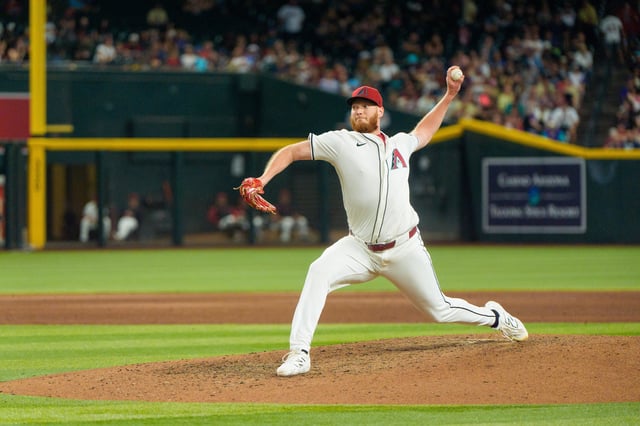 Apr 13, 2025; Phoenix, Arizona, USA;  Arizona Diamondbacks pitcher A.J. Puk (33) comes in to close in the ninth inning against the Milwaukee Brewers at Chase Field. Mandatory Credit: Allan Henry-Imagn Images/File Photo