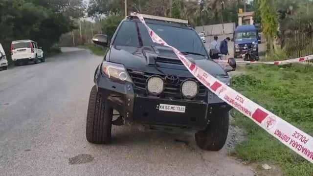 The car in which Ricky Rai, son of former underworld operative Muthappa Rai, was travelling in, damaged after an armed gang opened fire at him, at Bidadi near Bengaluru, on Saturday (PTI)