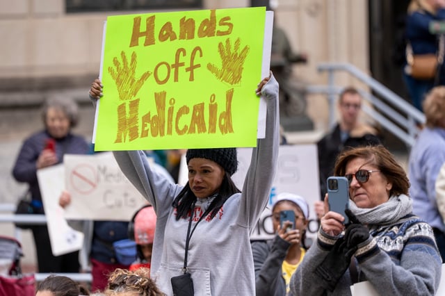 People gather at the Statehouse Annex for a rally to protect Medicaid, Trenton, New Jersey,  Thursday, Mar. 6, 2025.