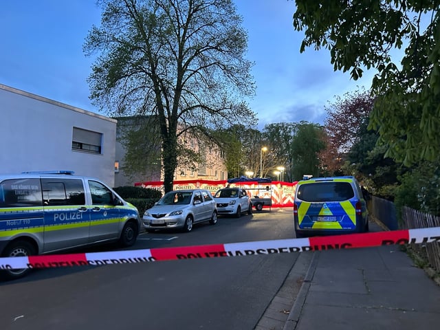 19 April 2025, Hesse, Bad Nauheim: The police are in action in Bad Nauheim. Two people have been killed by gunfire in Bad Nauheim, Hesse. The perpetrator is on the run, said a police spokesman. The "Bild" newspaper had previously reported. Photo: Mona Wenisch/dpa - ATTENTION: License plates in the background pixelated for legal reasons (Photo by Mona Wenisch/picture alliance via Getty Images)
