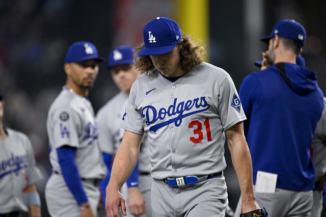 Apr 20, 2025; Arlington, Texas, USA; Los Angeles Dodgers starting pitcher Tyler Glasnow (31) leaves the game against the Texas Rangers during the fifth inning at Globe Life Field. Mandatory Credit: Jerome Miron-Imagn Images