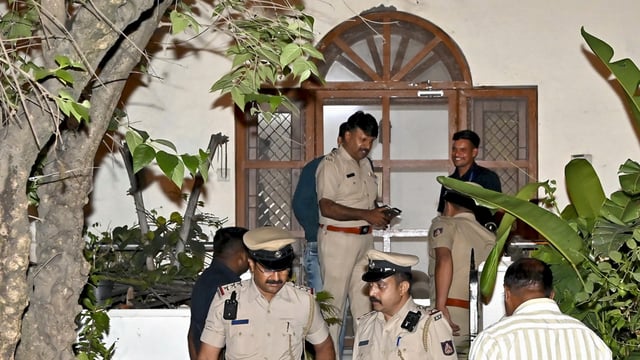 Police personnel investigate after former Karnataka Director General of Police Om Prakash was found dead at his residence in Bengaluru, Sunday night, April 20, 2025.