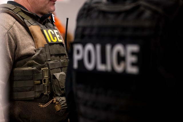 US Immigration and Customs Enforcement (ICE) agents, along with members of other federal law enforcement agencies, attend a pre-enforcement meeting in Chicago on January 26.